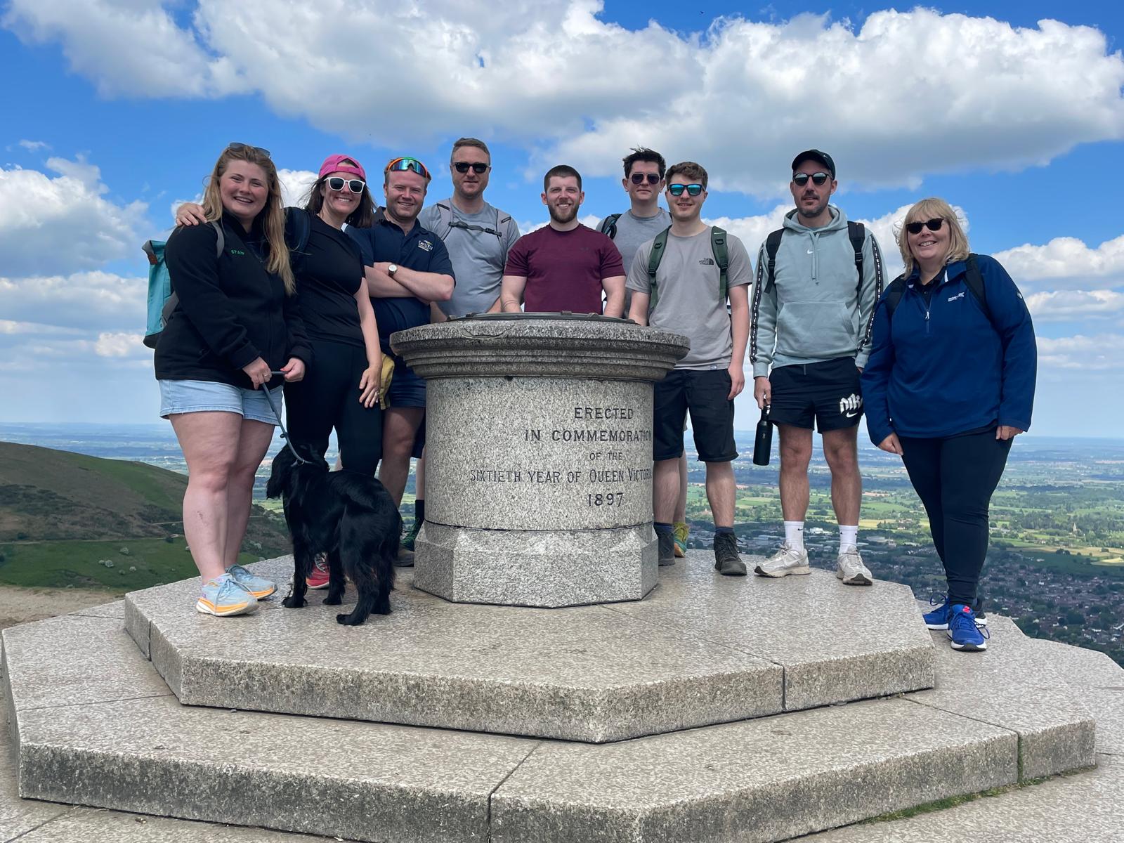 De Lacy team climb malvern hills for charity